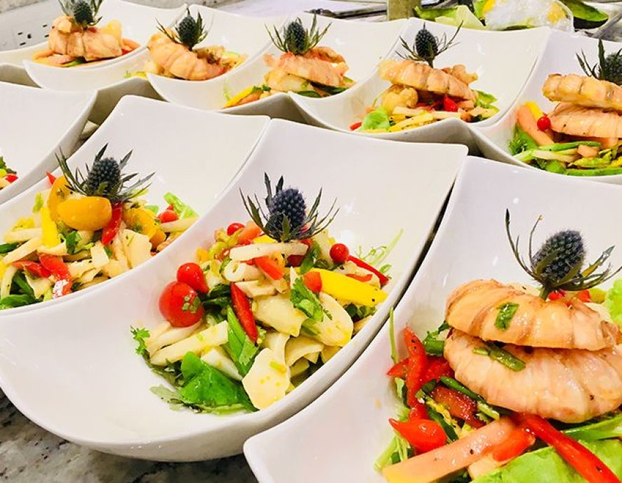 Paddleboarding at sunset in Grand Cayman